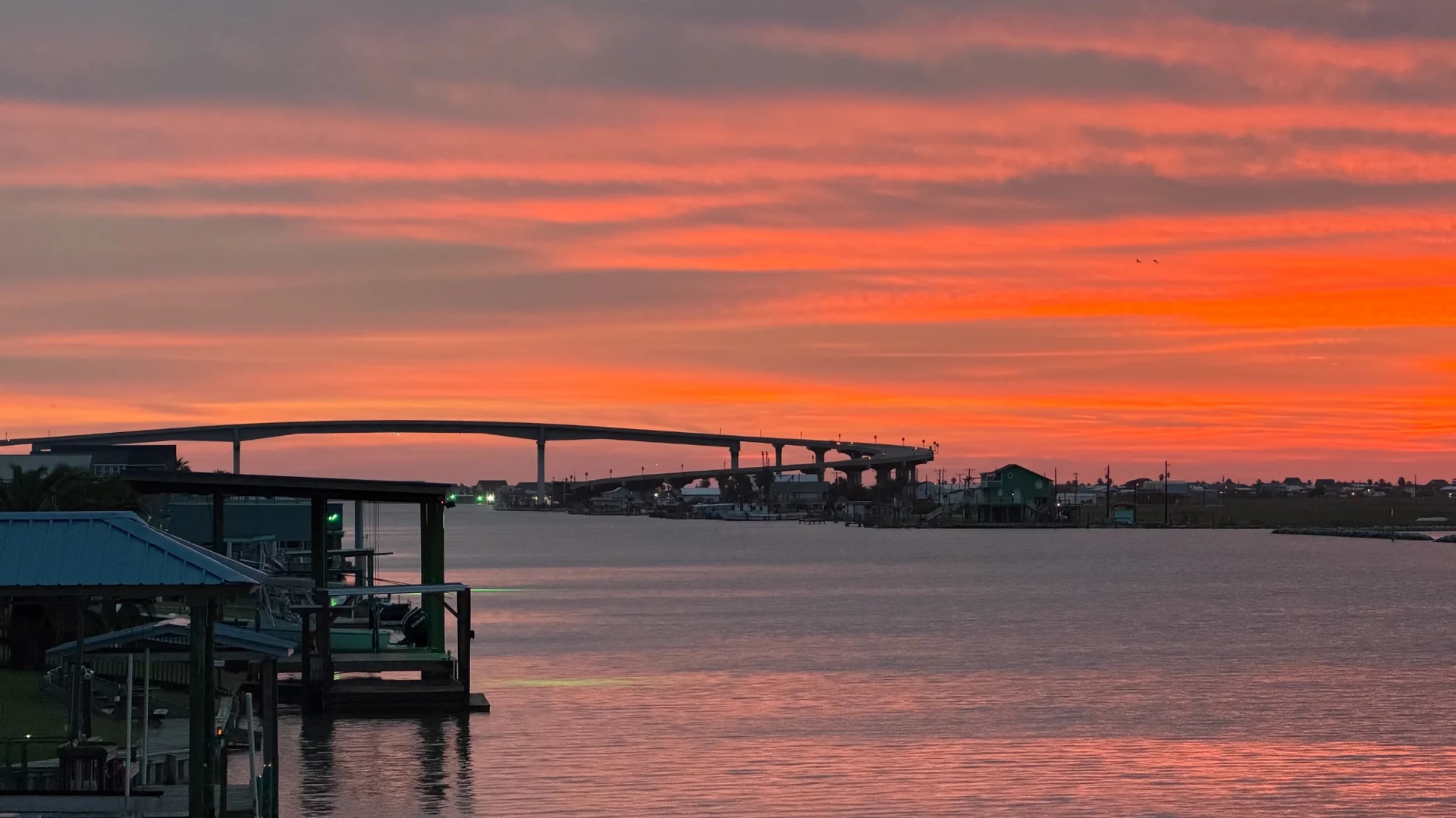 Sargent Corkscrew Bridge over the ICW beneath an orange sunset