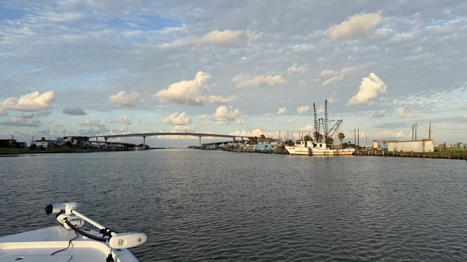 View from a boat toward the Sargent Corkscrew Bridge and working waterfront