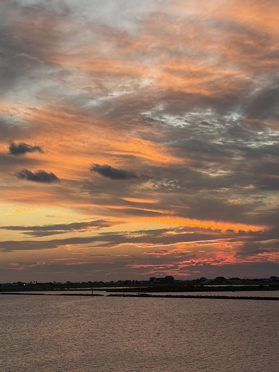 Vivid sunset over the Intracoastal Waterway near Sargent, Texas